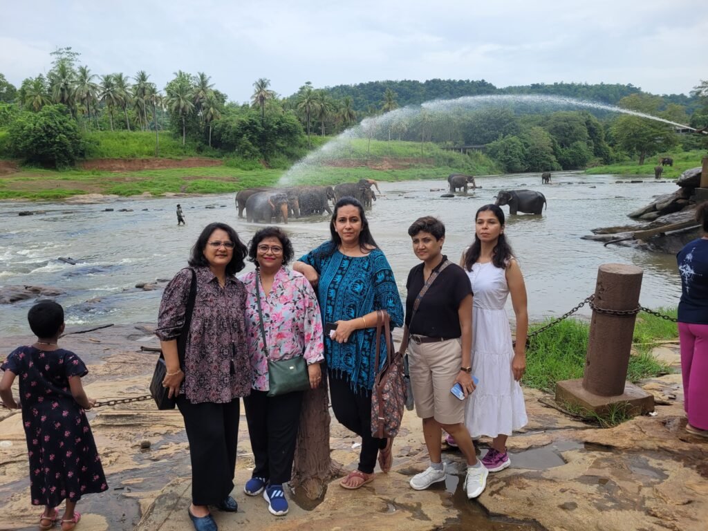 “Group of women enjoying travel therapy benefits during Sri Lanka ladies-only tour by Yellow Umbrella Holidays”